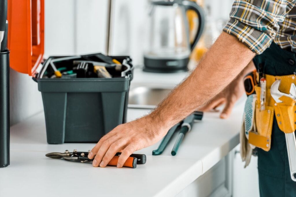 Workstation with tools for home maintenance