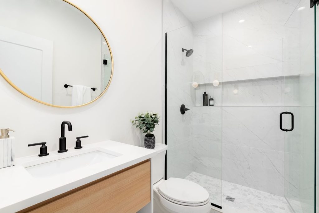 bathroom with walk in shower and built-in shower niche for storage