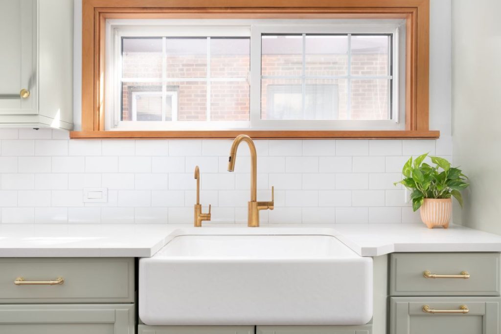 Farmhouse style sink in newly remodeled kitchen 