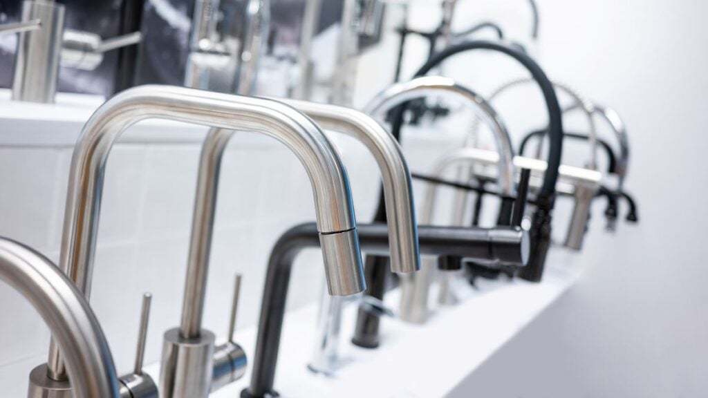 Kitchen sink faucet options in showroom