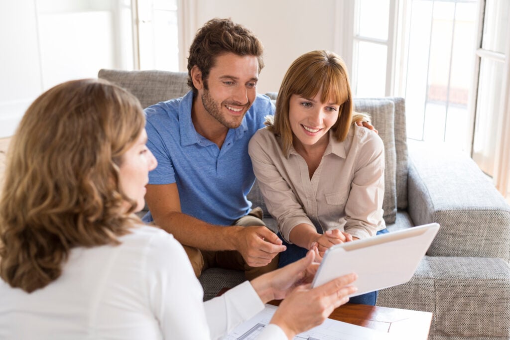 Couple reviewing design plans for their interior remodeling project