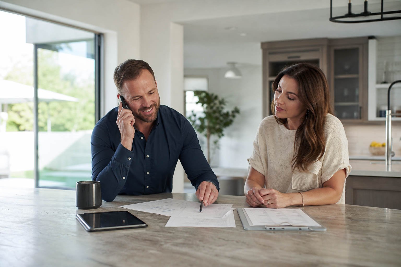 client-at-home-calling-contractor-to-set-up-consultation-2