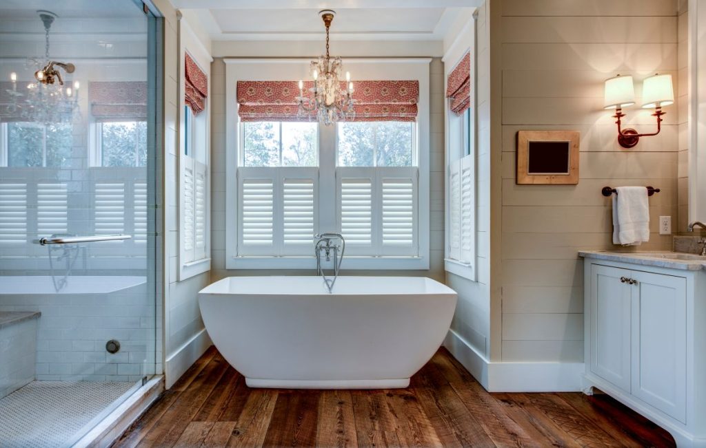 bathroom with large soaking tub and soft ambient lighting 