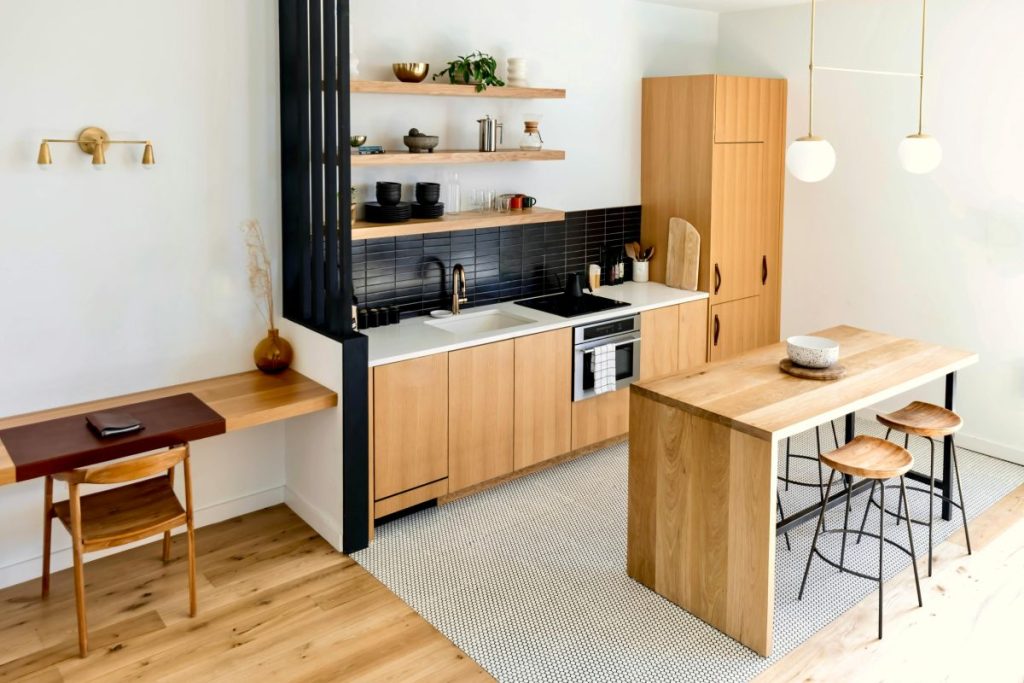 Modern wood kitchen with fold-down island