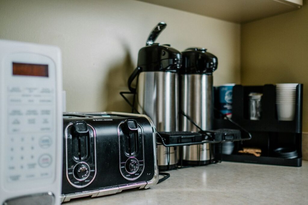 Temporary meal station with microwave, toaster and coffee essentials