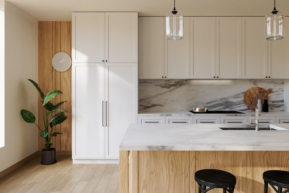 Modern kitchen with marble countertops and backsplash